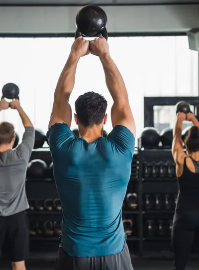 Group kettlebell workout in a gym